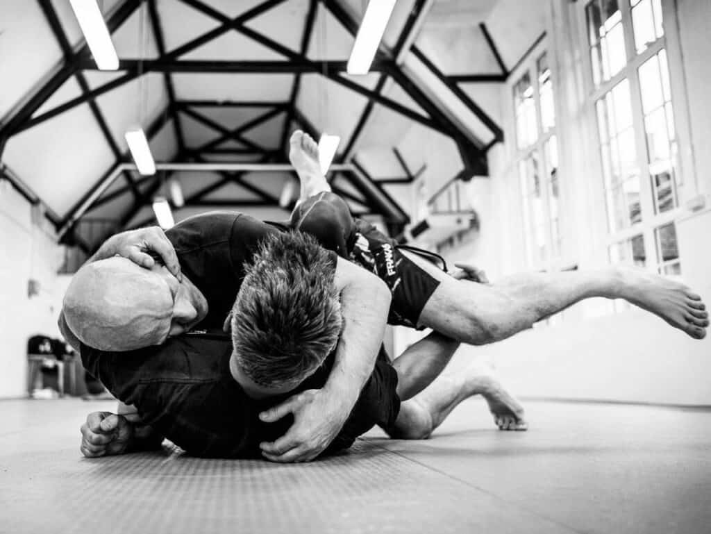 2 men in combat training