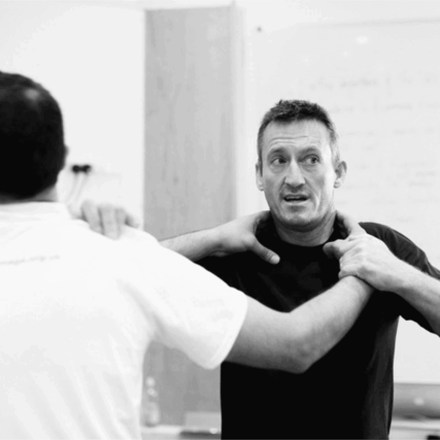2 men practicing Martial arts